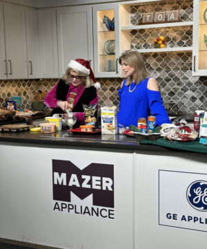 Edie Hand and Katherine Page preparing snacks